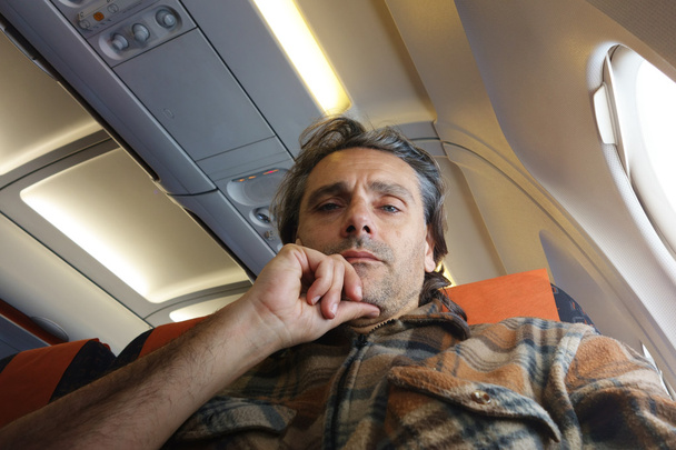 Człowiek na pokładzie samolotu - Zdjęcie, obraz