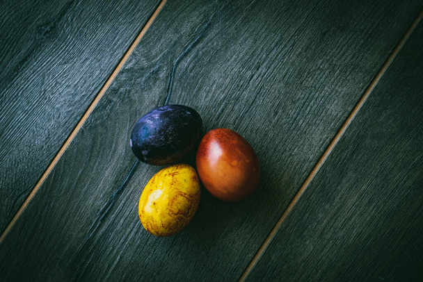 Easter eggs on a wooden background - Photo, Image