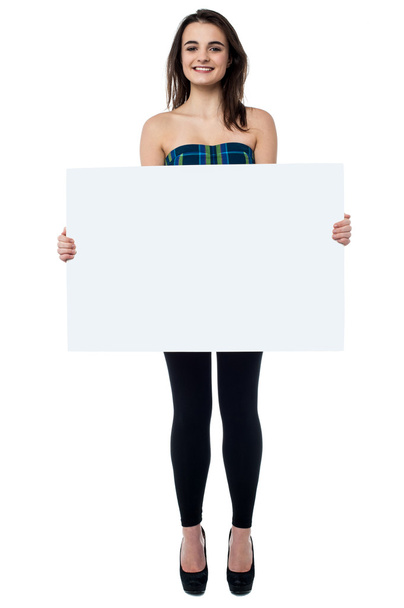 Girl displaying blank white board - 写真・画像