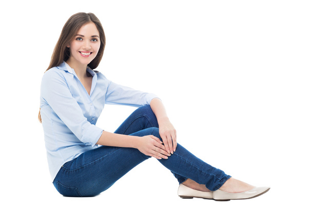Young woman sitting - Photo, image