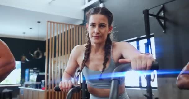Fitness, spin class and woman in gym for training, intense workout and exercise for healthy body. Sports, sweating and people on cycling equipment or machine for performance, endurance and wellness. - Footage, Video