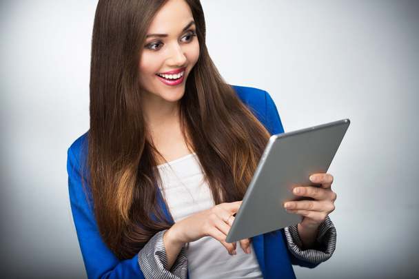 Woman looking at digital tablet - Photo, Image