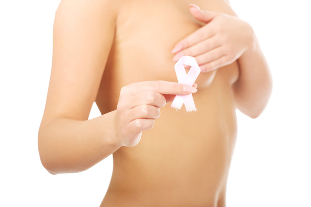 Topless woman with pink ribbon. - Valokuva, kuva