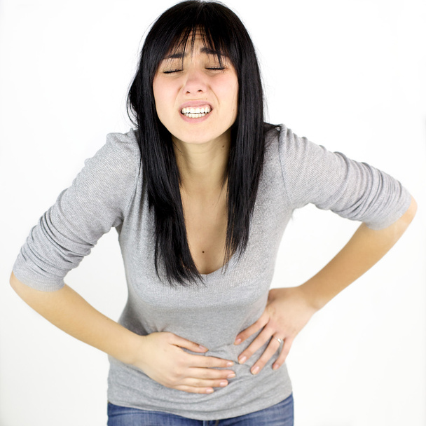 femme avec une forte douleur menstruelle
 - Photo, image