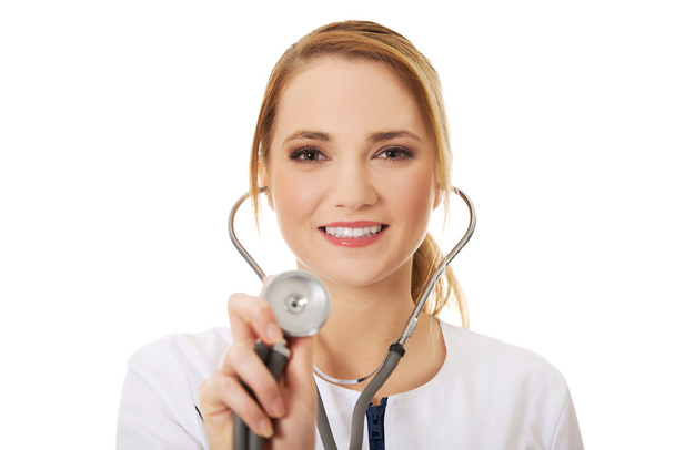 Young female doctor with stethoscope. - Foto, Imagen