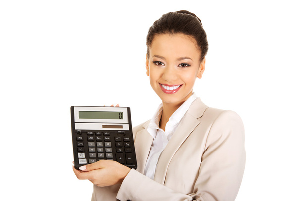 Smiling business woman with a calculator. - Fotoğraf, Görsel