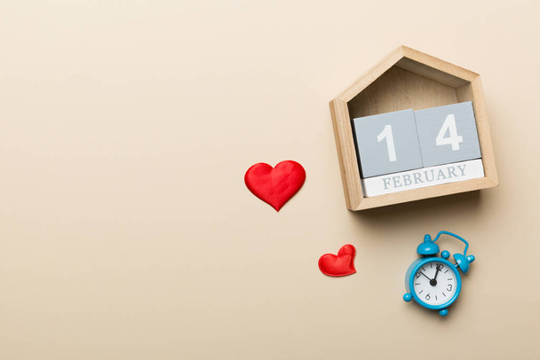 Valentine Day theme with wooden block calendar. Greeting card template for Valentines Day. Top view, copy space for text. - Valokuva, kuva