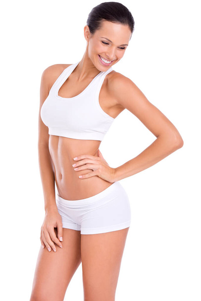 Body, smile and woman in underwear for fitness, health and wellness with benefits in studio. Diet, exercise and happy girl in sportswear for self care, weight loss and results on white background - Photo, Image