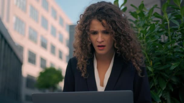 Caucasian girl business woman female businesswoman outdoors disappointed sad young entrepreneur office employee looking at laptop shock failure lost upset computer bad news negative emotions in city - Footage, Video