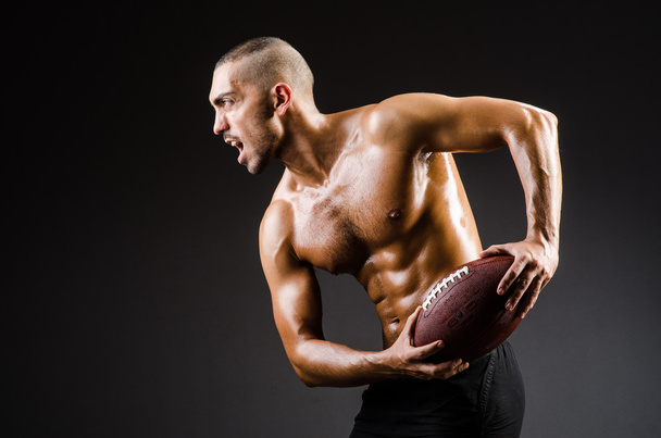 Muscular football player - Photo, Image