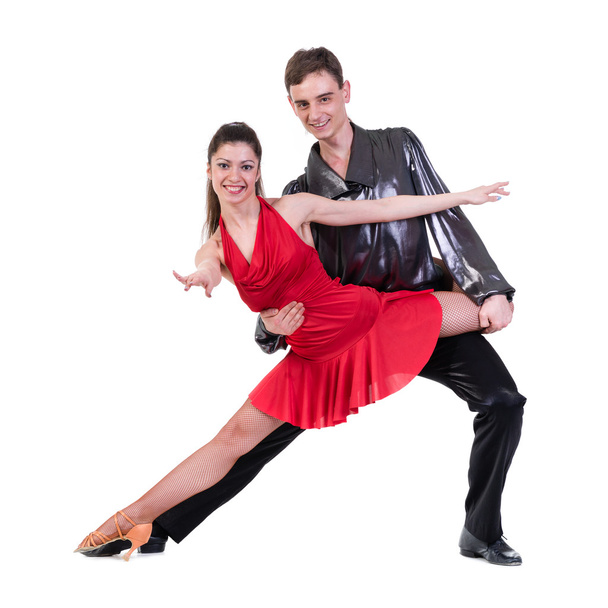 Full length of young ballet couple dancing on white background - Fotó, kép