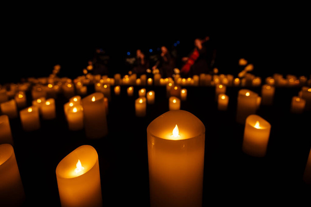 lots of glowing candles background for design purpose - Photo, Image
