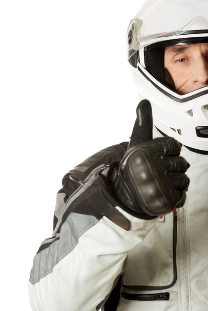 Man in driver costume with thumbs up - Φωτογραφία, εικόνα