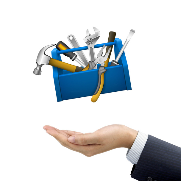 businessman's hand holding tools box - Foto, afbeelding