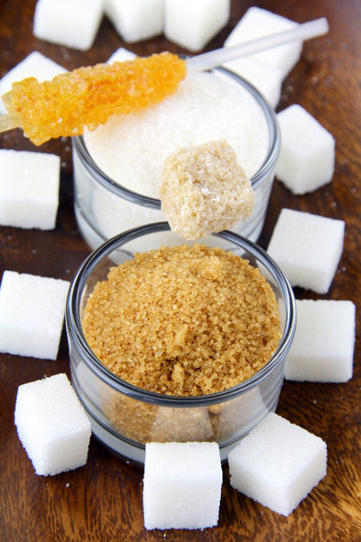 Several types of sugar - refined sugar, brown sugar and granulated sugar - Photo, Image
