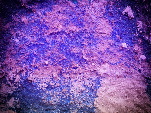 close-up shot van paars getinte stenen textuur voor achtergrond - Foto, afbeelding
