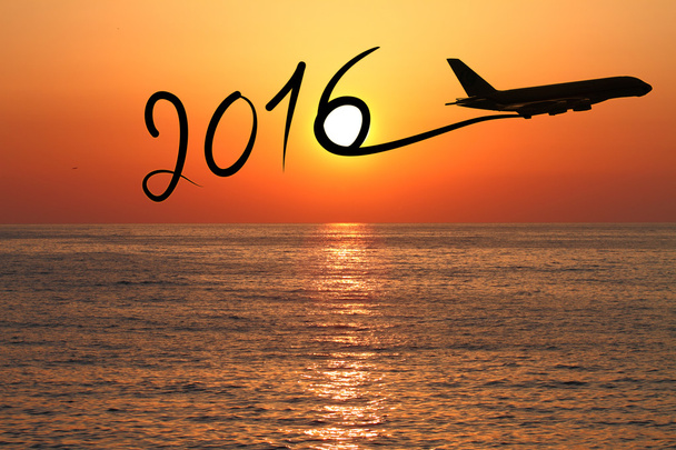 Yeni yıl 2016-uçakla yayında günbatımında çizim - Fotoğraf, Görsel