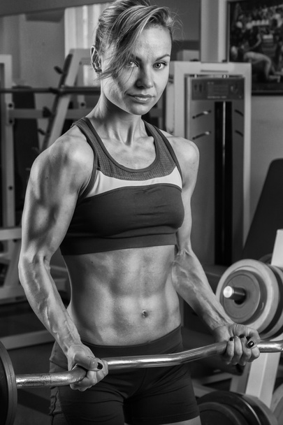 Woman training  in the gym - Photo, image