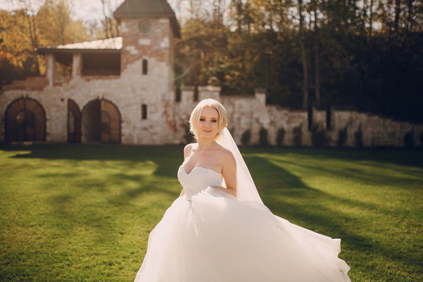 blonde bride with her groom - Valokuva, kuva