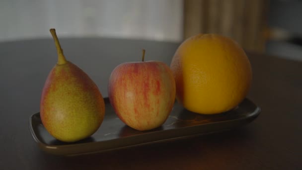 Organiczne owoce jabłka Gruszka Owoce żywności Odżywianie z witaminami Tło - Materiał filmowy, wideo