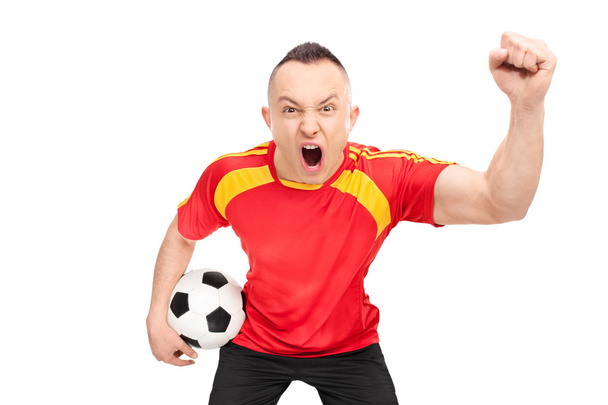 Football fan holding football and cheering - Fotografie, Obrázek