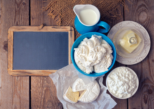 Chalkboard, milk and cottage cheese - 写真・画像