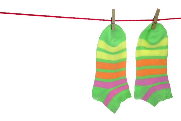 Socks Hanging Isolated On White Background - Foto, Imagen