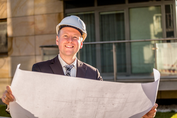 Construction manager with blueprints - Photo, Image