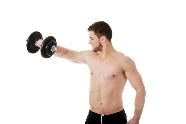 Muscular sports man weightlifting. - Photo, Image