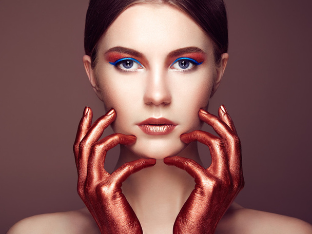 Portrait of beautiful young woman with art make-up - Fotoğraf, Görsel
