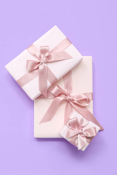 Gift boxes on lilac background. International Women's Day - Photo, Image