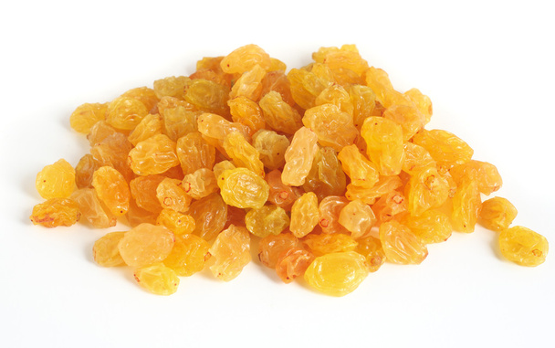 Golden raisins over white - Photo, Image