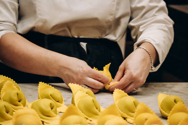 The chef prepares the cappellacci with ricotta and spinach - Photo, Image