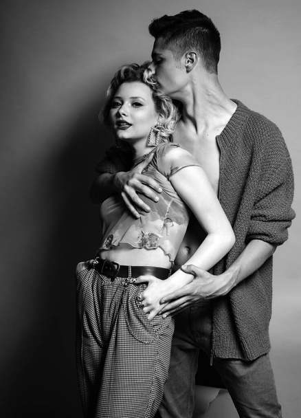 Lovely couple have warm cuddle. Love and trust. We are better when we together. Family. Young and cocky lovers. Beautiful young couple. Attractive man and woman being playful. Copy space - 写真・画像