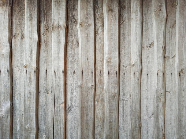 Hintergrund sind Bretter aus Holzzaun. Altes braunes Holz Hintergrund. Holzstruktur. Grunge-Textur. Vintage-Holzplanken. Holz Zaun Textur. Holzdekoration - Foto, Bild