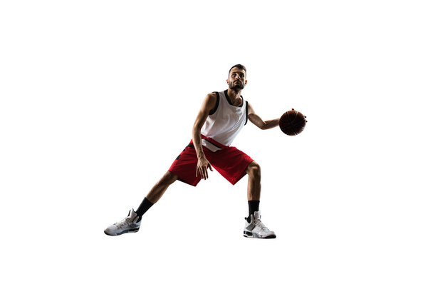 Isolated basketball player in action is flying high - Photo, Image