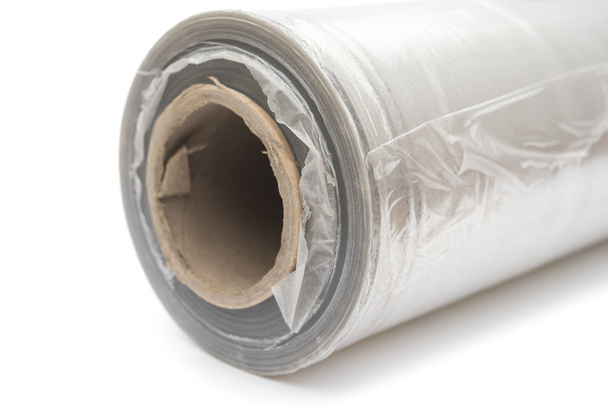 Roll of wrapping plastic stretch film on white background - Photo, Image