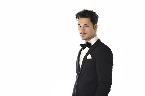 Elegant young man with suit and bow-tie - Foto, afbeelding