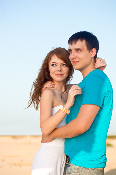 Couple embracing on beach - Photo, Image