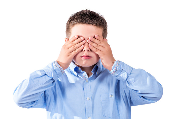 child covering his eyes - Photo, image