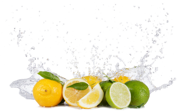 Lemons and limes with water splashes on white - Foto, immagini