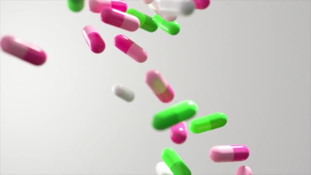 Cápsulas medicinales en cascada sobre un fondo, simbolizando un escenario de sobredosis dentro del sector farmacéutico. - Imágenes, Vídeo