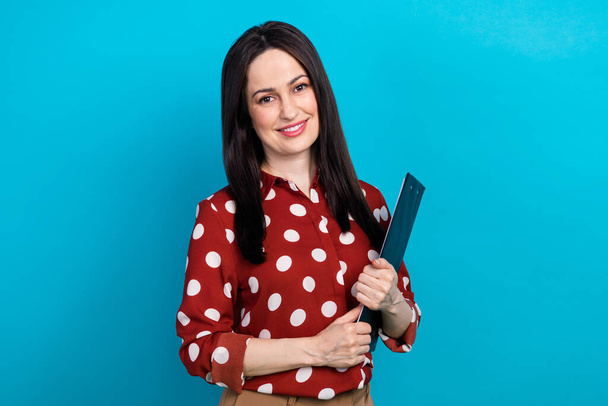 Portrait of successful confident girl with brunette hair wear red shirt hold clipboard at interview isolated on blue color background. - Foto, Bild