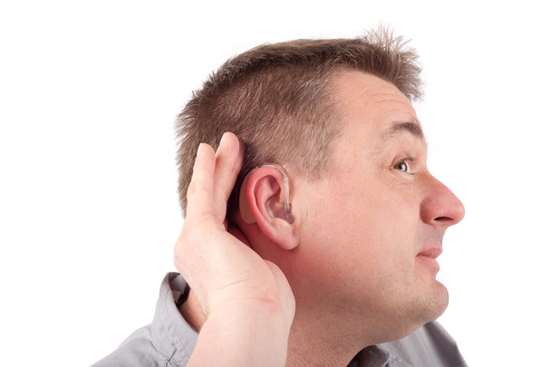 Man wearing hearing aid - Foto, afbeelding