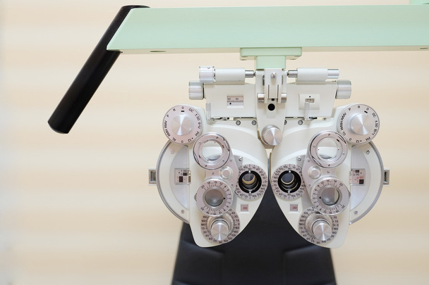 Eyesight measurement with a optical phoropter - 写真・画像
