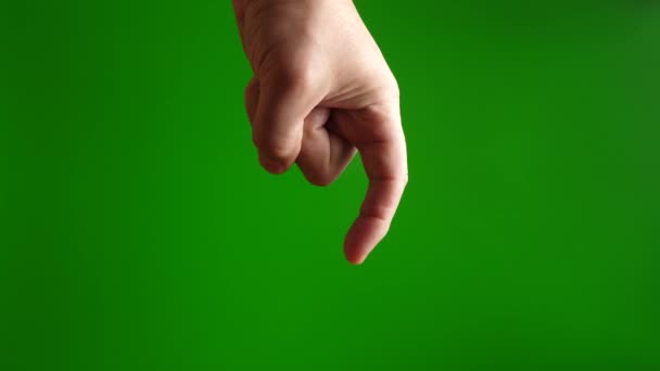 Mano umana mostrando il gesto del gancio con le dita su sfondo verde. - Filmati, video