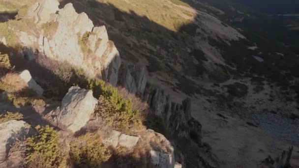 Drone top view relieves frightening heights and dangerous rocky cliffs - Footage, Video