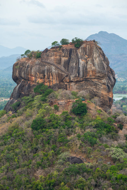 Scenery view of Sigiriya rock an iconic tourist destination and one of UNESCO world heritage site in Sri Lanka. King Kashyapa (477  495 CE) built his palace on the top of this rock. - Photo, Image