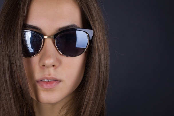 portrait of a girl in sunglasses - Фото, изображение