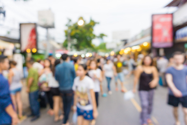 Blur of tourists are walking and shopping in Chatuchak market - Photo, Image